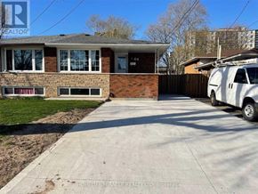 Hamilton (Riverdale) apartment for rent - A house with a white van parked in front of it.