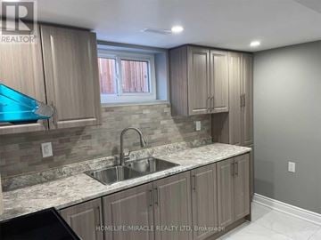 Hamilton (Riverdale) apartment for rent - A kitchen with a sink and cabinets.