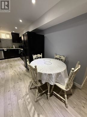 Toronto (Guildwood) apartment for rent - A dining room with a table and chairs.