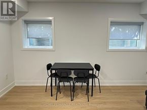 Mississauga (Lakeview) apartment for rent - A dining room with a table and chairs.