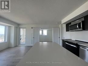 Toronto (Etobicoke West Mall) condo for rent - A spacious kitchen with a dishwasher and microwave.