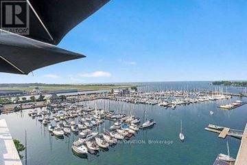 Toronto (Niagara) condo for rent - A marina with boats docked in the water.