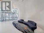 Toronto (Church-Yonge Corridor) condo for rent - A black and silver massager sits on a marble table.