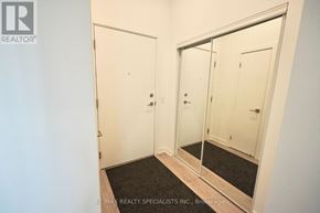 Toronto (Church-Yonge Corridor) condo for rent - A hallway with a mirrored door and a black doormat.