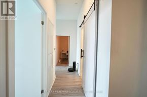 Toronto (Church-Yonge Corridor) condo for rent - A hallway with a black bag on the floor.