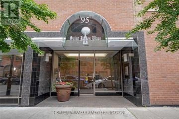 Toronto (Church-Yonge Corridor) condo for rent - The front of a building with a sign that says Saint James Place.