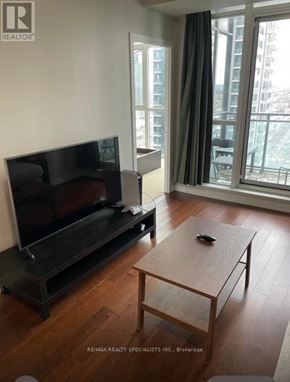 Mississauga (Creditview) condo for rent - A living room with a flat screen TV and a coffee table.
