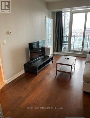Mississauga (Creditview) condo for rent - A living room with a flat screen TV and a wooden floor.