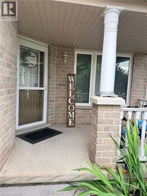Cambridge apartment for rent - A welcome mat is on the front porch of a house.