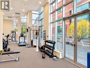 Vancouver apartment for rent - A gym with a variety of equipment including weights and cardio machines.