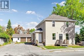 Kawartha Lakes (Lindsay) triplex for rent - A house with a garage is for sale.