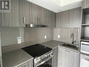 Toronto (Church-Yonge Corridor) condo for rent - A kitchen with a stove top oven and a sink.