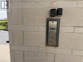 Ottawa condo for rent - A fire department access panel is mounted on a wall.