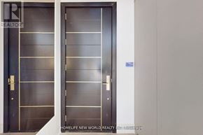 Toronto (Leaside) apartment for rent - A pair of dark wooden doors with glass panels in between.