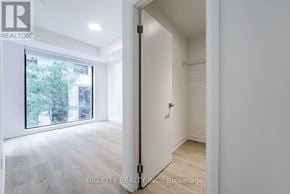 Toronto (Thorncliffe Park) condo for rent - A white room with a sliding door leading to a balcony.