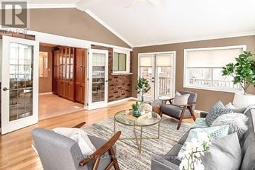 Grimsby (Grimsby Beach) apartment for rent - A living room with a grey couch and a glass table.