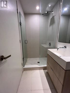 Toronto (Mount Pleasant West) condo for rent - A bathroom with a sink, mirror, and shower.