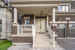 Vaughan (Kleinburg) apartment for rent - A house with a front porch and a white door.