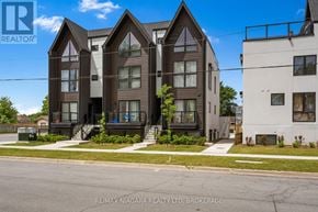 Niagara Falls (Oldfield) condo for rent - A modern two-story house with a balcony is for sale by RE/MAX Niagara Realty Ltd.