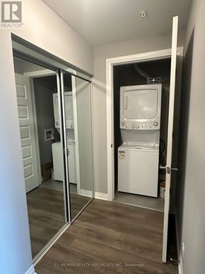 Milton (Fo Ford) condo for rent - A white fridge is in a small room with a mirror on the wall.