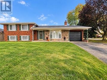 Hamilton (Rolston) apartment for rent - A house with a lawn in front of it.