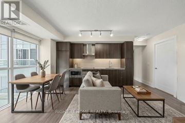 Toronto (Waterfront Communities) condo for rent - A modern living room with a dining table and chairs.