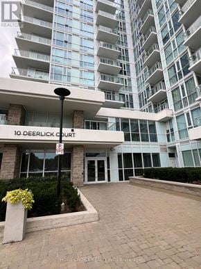 Toronto (Parkwoods-Donalda) condo for rent - The entrance to a building with the sign 10 Deerlick Court.