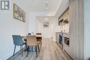 Toronto (Church-Yonge Corridor) condo for rent - A modern kitchen with a dining table and chairs.