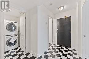 Toronto (Dorset Park) condo for rent - A black and white checkered floor in a hallway.