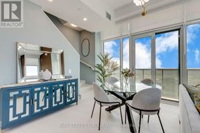 Mississauga (City Centre) house for rent - A dining room with a glass table and chairs.