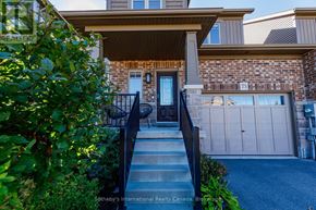 Collingwood apartment for rent - A house with a garage and a driveway leading to the front door.