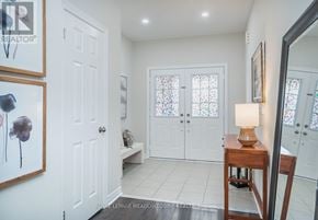 Milton (Ha Harrison) apartment for rent - A white hallway with a bench and a lamp.