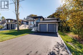 Port Colborne (Sugarloaf) apartment for rent - A real estate image of a house with a garage.