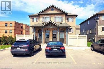 London South (South W) townhouse for rent - A building with a car parked in front of it.
