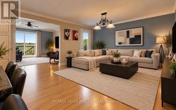 Ottawa apartment for rent - A spacious living room with a large couch and a coffee table.