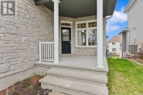 Clarence-Rockland apartment for rent - A house with a porch and a sign that says "CREATOR".