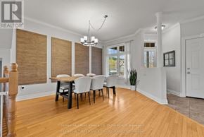 Clarence-Rockland apartment for rent - A dining room with a wooden table and chairs.