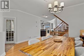 Clarence-Rockland apartment for rent - A dining room with a wooden table and chairs.