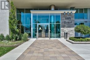 Mississauga (Clarkson) condo for rent - The front of a building with the number 1055 on it.