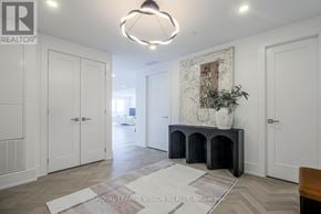 Toronto (Waterfront Communities) condo for rent - A well-lit room with a fireplace and a rug on the floor.