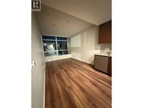 Richmond apartment for rent - A room with wooden flooring and a window.