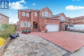 Markham (Middlefield) apartment for rent - A large red brick house with a driveway in front.