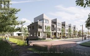 Mississauga (Port Credit) townhouse for rent - A street view of a residential area with a person riding a bicycle.