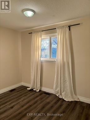 Toronto (Bendale) apartment for rent - A room with a window and curtains.