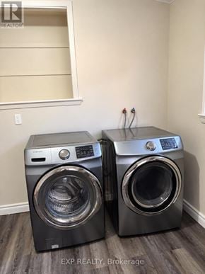 Toronto (Bendale) apartment for rent - Two front load washing machines in a laundry room.