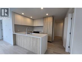 North Vancouver apartment for rent - A kitchen with a sink and cabinets.