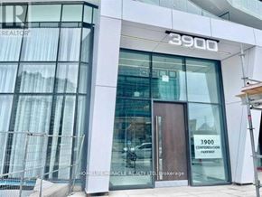 Mississauga (City Centre) condo for rent - The front of a building with the number 3900 on it.