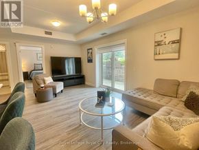 Centre Wellington (Elora/Salem) condo for rent - A living room with a couch, chair, and coffee table.