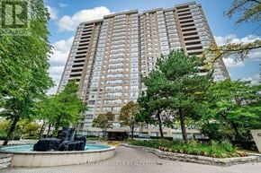 Brampton (Fletcher's Creek South) condo for rent - A tall residential building with a pool in front.