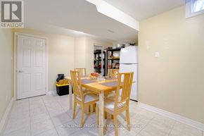 Brampton (Fletcher's West) apartment for rent - A dining room with a table and chairs.